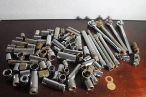 lot 36 image: 38 RATCHET WITH GENEROUS AMOUNT ASSORTED VARIOUS SIZE SOCKETS&nbsp