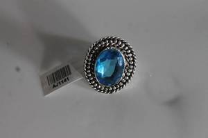 lot 21 image: GERMAN SILVER BLUE TOPAZ RING SIZE 6