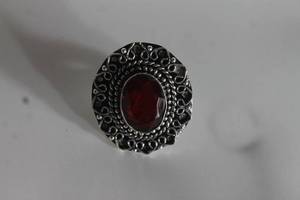 lot 27 image: GERMAN SILVER GARNET RING SIZE 6
