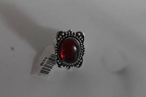 lot 28 image: GERMAN SILVER GARNET RING SIZE 8