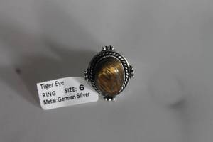 lot 29 image: GERMAN SILVER TIGER EYE RING SIZE 6