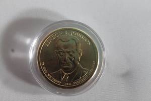 lot 56 image: PRESIDENT DOLLAR COIN LYDON B JOHNSON 1963-1969