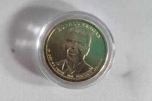 lot 59 image: PRESIDENT DOLLAR COIN RONALD REAGAN 1981-1989