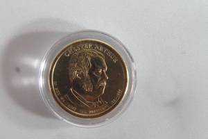 lot 60 image: PRESIDENT DOLLAR COIN CHESTER ARTHUR 1881-1885