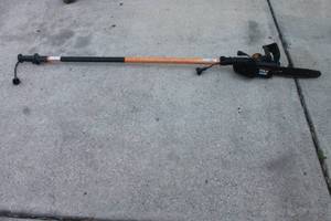 lot 125 image: REMINGTON POLE SAW NEEDS WORK