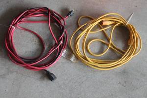 lot 147 image: TOTAL OF 2 - 25FT YELLOW  RED EXTENSION CORDS&nbsp