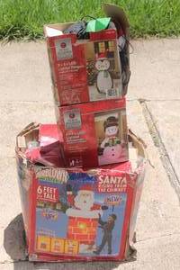 lot 214 image: TOTAL OF 3 CHRISTMAS AIRBLOWN INFLATABLES , 6 FEET SANTA RISING FROM THE CHIMNEY &nbsp 6 FEET LIGHTED SNOWMAN  3 FEET LED LIGHTED PENGUIN .&nbsp