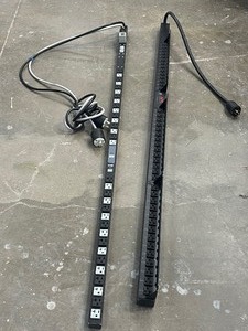 lot 93 image: 2 POWER DISTRUDUTION STRIPS APC AP7562 AND TRIPP LITE PDUMV40