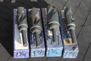 lot 18 image: Set of four Drill Master Silver &amp Deming high-speed steel drill bits with reduced shanks, complete with original boxes.
