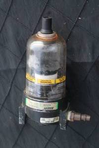 lot 36 image: Speedaire pneumatic air filter regulator unit with a clear bowl, showing light wear and scuffing from previous use.