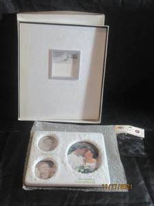 lot 65 image: HALLMARK STORIES ALBUM AND RUSS 3 SECTION PICTURE FRAME