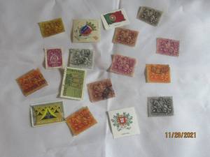 lot 96 image: 17 VINTAGE PORTUGAL POSTAL STAMPS