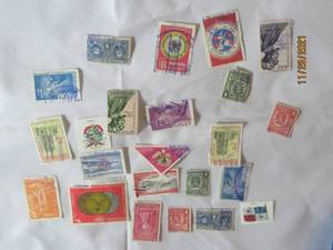 lot 99 image: 23 VINTAGE PANAMA POSTAL STAMPS