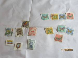 lot 101 image: 15 VINTAGE ECUADOR POSTAL STAMPS
