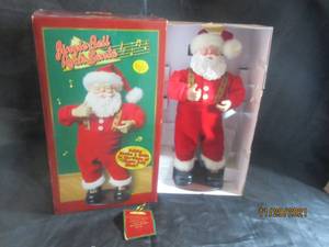 lot 114 image: NEW IN BOX JINGL BELL ROCK SANTA