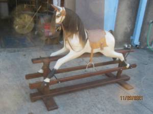 lot 145 image: ANTIQUE ROCKING HORSE ON GLIDER BASE 69 LONG 38 FLOOR TO SEAT