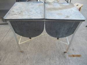 lot 261 image: ANTIQUE WASHTUB WITH DRAIN SPOUTS