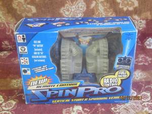 lot 17 image: SPIN PRO REMOTE CONTROL VERTICAL STUNTS AND SPINNING VEHICLE