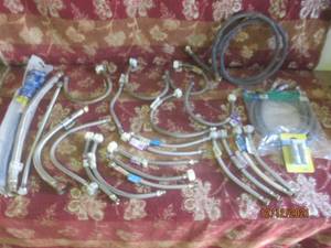 lot 42 image: 20 PLUS ASSORTED WASHER AND SINK CONNECTORS