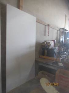lot 121 image: SHEET OF PARTICLE BOARD WOOD 8FT X 4FT