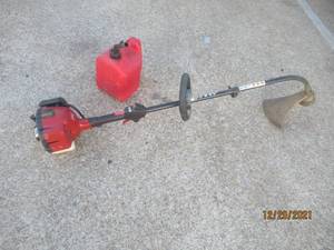 lot 214 image: TORO GAS WEEDEATER WITH BLITZ 2GAL GAS CAN
