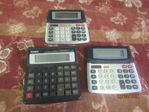 lot 304 image: 3 CALCULATORS