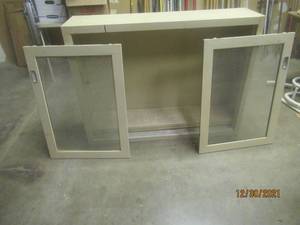 lot 345 image: METAL CABINET WITH SLIDING DOORS AND SHELVES