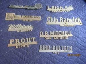 lot 82 image: VINTAGE METAL DEALERSHIP EMBLEM BADGES  LOT OF 8.