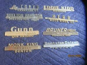 lot 85 image: VINTAGE METAL DEALERSHIP EMBLEM BADGES  LOT OF 8.