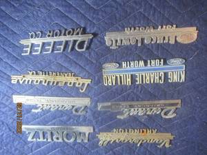 lot 88 image: VINTAGE METAL DEALERSHIP EMBLEM BADGES  LOT OF 8.
