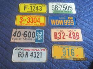 lot 94 image: VINTAGE BICYCLE PLATES LOT OF 8.
