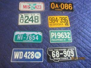 lot 96 image: VINTAGE BICYCLE PLATES LOT OF 8.