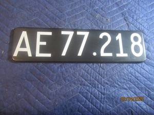 lot 147 image: VINTAGE FOREIGN LICENSE PLATE