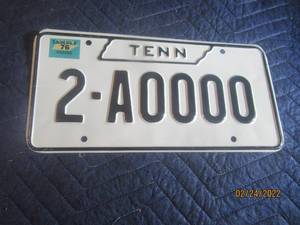 lot 153 image: VINTAGE 1976 TENNESSEE SAMPLE LICENSE PLATE