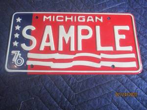 lot 192 image: VINTAGE 1976 MICHIGAN SAMPLE LICENSE PLATE