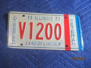 lot 238 image: VINTAGE 1973 ILLINOIS DISABLED VETERAN LICENSE PLATE
