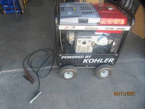 lot 51 image: TRITON 9000RS 3 IN 1 WELDERGENERATORCOMPRESSOR BARELY USED WITH MANUAL AND COVER. LIKE NEW CONDITION