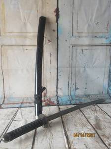lot 269 image: CHINESE LETTERING SWORD WITH BLACK HANDLE AND SCABBARD&nbsp