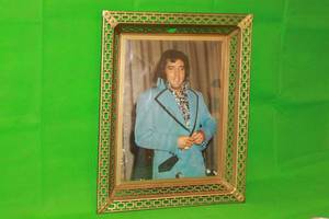 lot 28 image: VINTAGE ELVIS PRESLEY PHOTO IN MID CENTURY MODERN GOLD METAL FRAME ( 21 X 17 )
