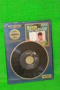 lot 30 image: ELVIS PRESLEY,SANTA CLAUS IS BACK IN TOWN AND BLUE CHRISTMAS RELEASED 1965 ,COLLECTORS AUTHORIZED EDITION,45 RPM SINGLE PLATINUM PLAQUE ,SERIES No 25 OF 90 ,( 11 X 8.5 )