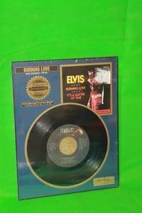 lot 32 image: ELVIS PRESLEY,BURNING LOVE  RELEASED 1972  ,COLLECTORS AUTHORIZED EDITION,45 RPM SINGLE PLATINUM PLAQUE ,SERIES No 13 OF 90 ,( 11 X 8.5 )