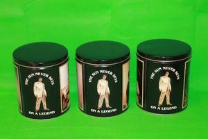 lot 38 image: TOTAL OF 3 VINTAGE 1993 ELVIS PRESLEY, THE SUN NEVER SETS ON A LEGEND TIN CANISTERS , 7H