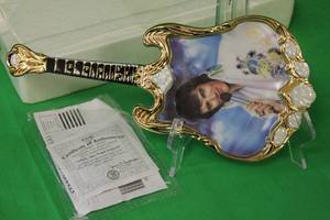 lot 47 image: 1974 THE VEGAS LEGENDOF THE CENTURY SECOND ISSUE GUITAR PLATE #A3290 ,WITH C.OA