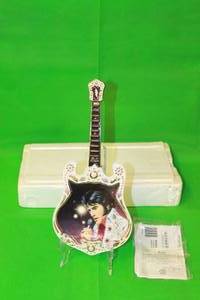 lot 48 image: ELVIS PRESLEY  THE PASSION ELEVENTH ISSUE IN ENTERTAINER OF THE CENTURY GUITAR PLATE No A02127 ,WITH COA ,13