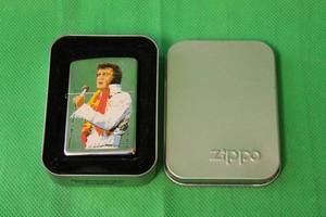 lot 64 image: ELVIS PRESLEY,ALOHA ,VINTAGE ZIPPO LIGHTER WITH ORIGINAL BOX