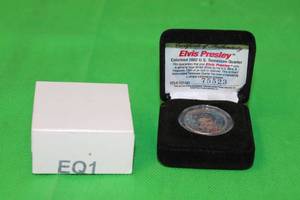 lot 74 image: ELVIS PRESLEY,COLORIZED 2002 U.S TENNESSEE UNCIRCULATED GENUINE LEGAL TENDER QUARTER No 75523 ,WITH COA