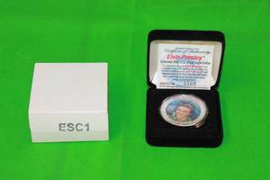 lot 75 image: ELVIS PRESLEY ,COLORIZED 2002 U.S UNCIRCULATED GENUINE LEGAL TENDER SILVER EAGLE DOLLAR No 5505,WITH COA