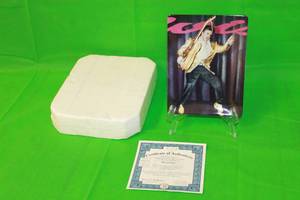 lot 78 image: ELVIS PRESLEYHOUND DOG  SECOND ISSUE IN AT THE BEGINNING COLLECTION PLATE No 2631A, BY EMMETT , 8 X 6.5