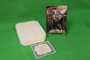 lot 86 image: ELVIS PRESLEY JAILHOUSE ROCK  FIFTH ISSUE IN AT THE BEGINNING COLLECTION PLATE No 1709A, BY EMMETT,WITH COA ,8 X 6.5