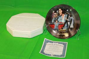 lot 94 image: ELVIS PRESLEY MADISON SQUARE GARDENTHIRD  ISSUE IN 40TH ANNIVERSARY CELEBRATION PLATE No 578A, WITH COA , 8 DIAM
